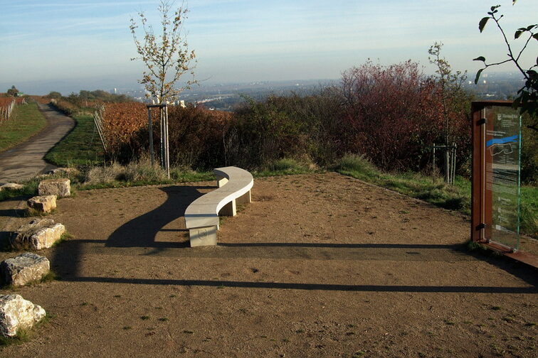 Reading bench made of natural stone on the Erich Koch High Trail