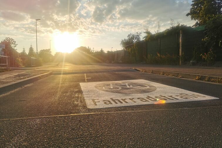 Picture of bicycle road with sunset