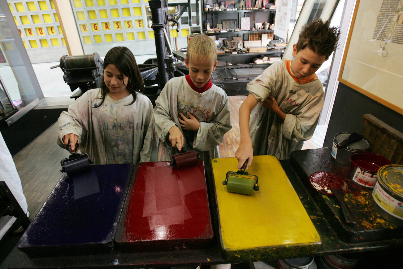 Children in the print store